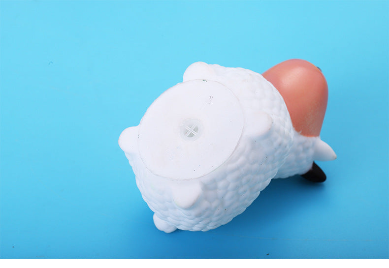 Baby playing in water and bathing children's toys in mixed batches called vinyl water spray toys